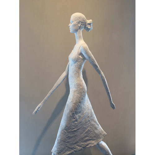 Woman Walking Tall Sculpture